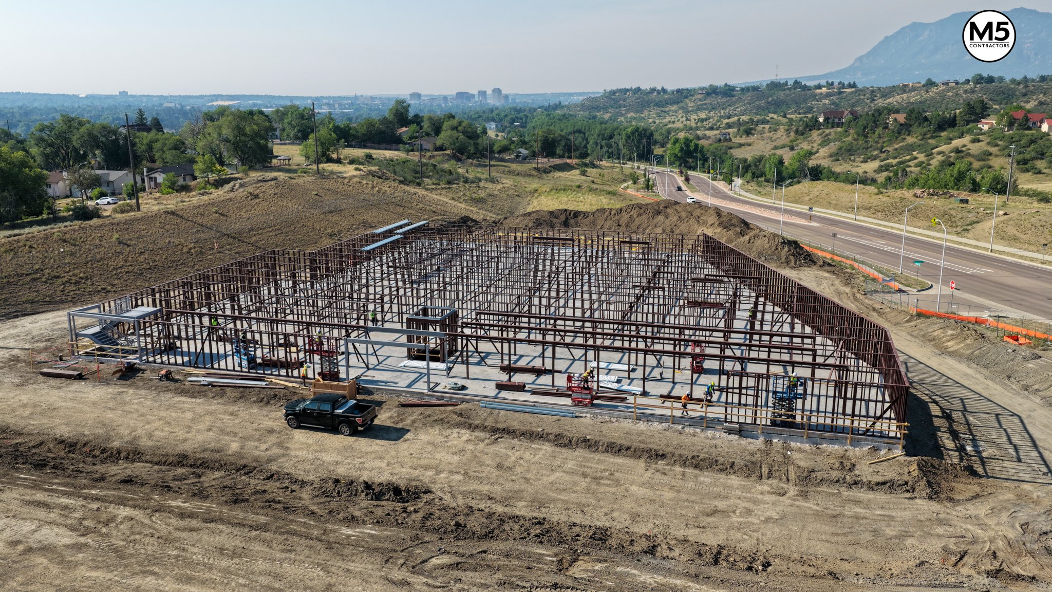 Construction progress drone aerial M5 Contractors commercial building steel frame